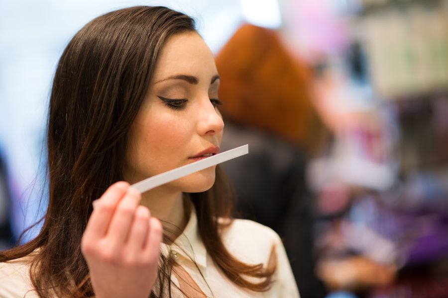 woman testing fragrance